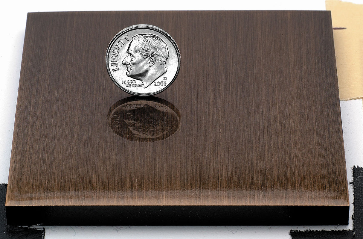 Sample of dark aged bronze finish for sign letters.