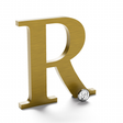 Gold anodized aluminum sign letter R.