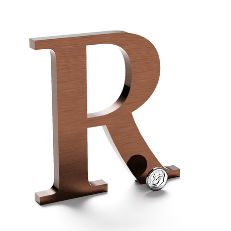 Aged copper sign letter R.