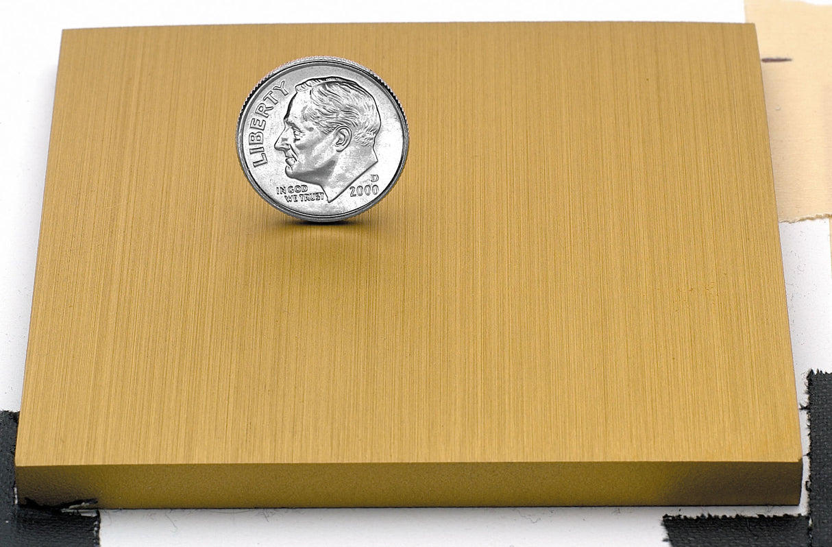 Sample of gold anodized aluminum finish for sign letters.