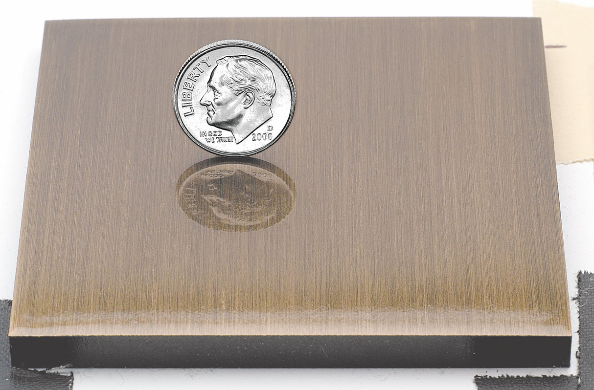 Sample for a lightly aged bronze sign letter finish.