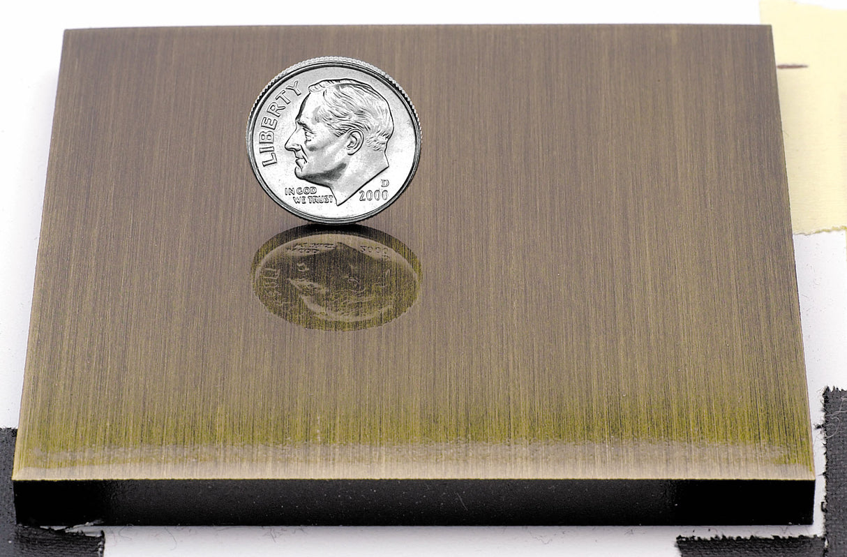 Sample of an aged brass finish for sign letters.