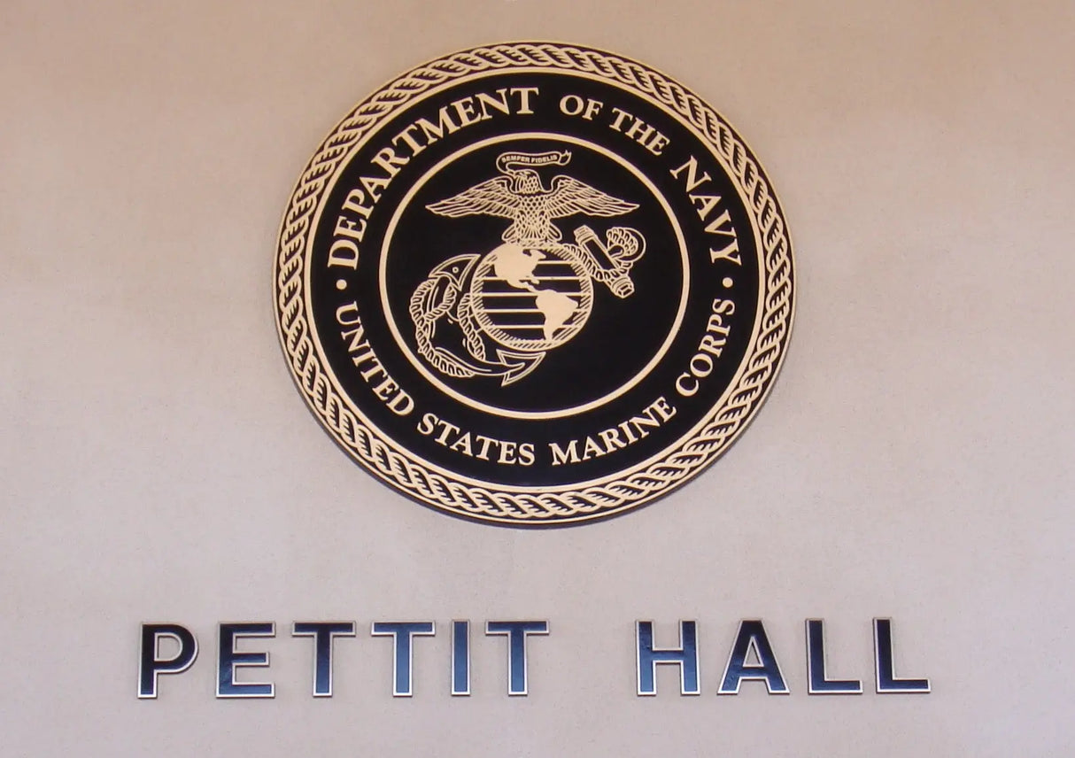 Solid cast division 10 BAA & BABA certified architectural bronze US Marine Corps seal mounted to a wall