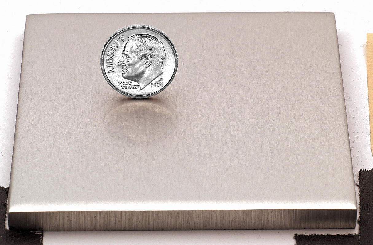 Sample of polished champagne anodized aluminum finish for sign letters.