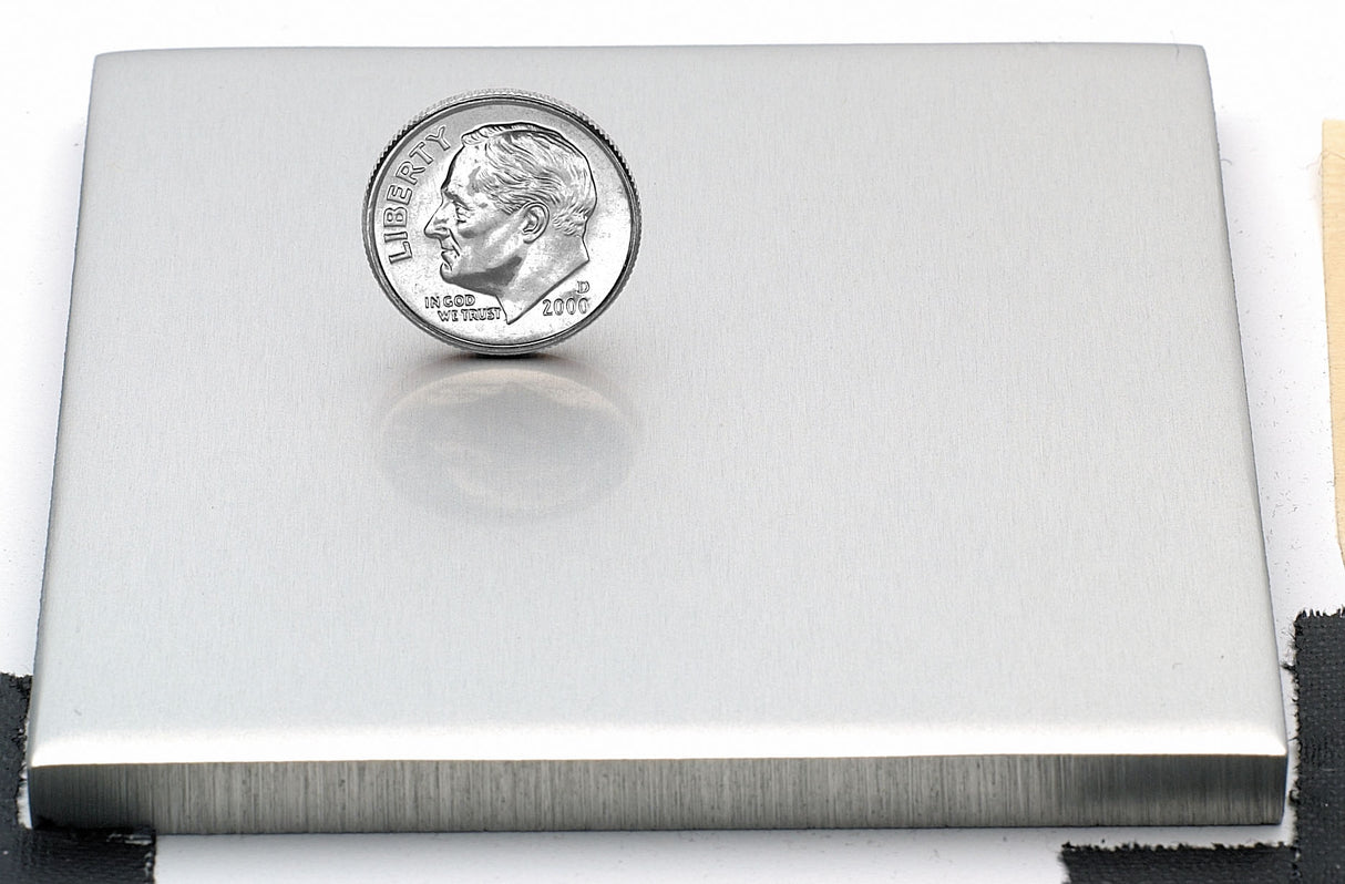 Sample of polished clear anodized aluminum finish for sign letters.