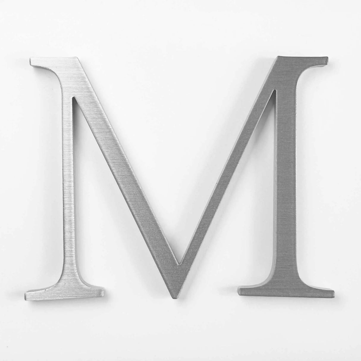 Horizontally brushed solid aluminum division 10 architectural sign letter
