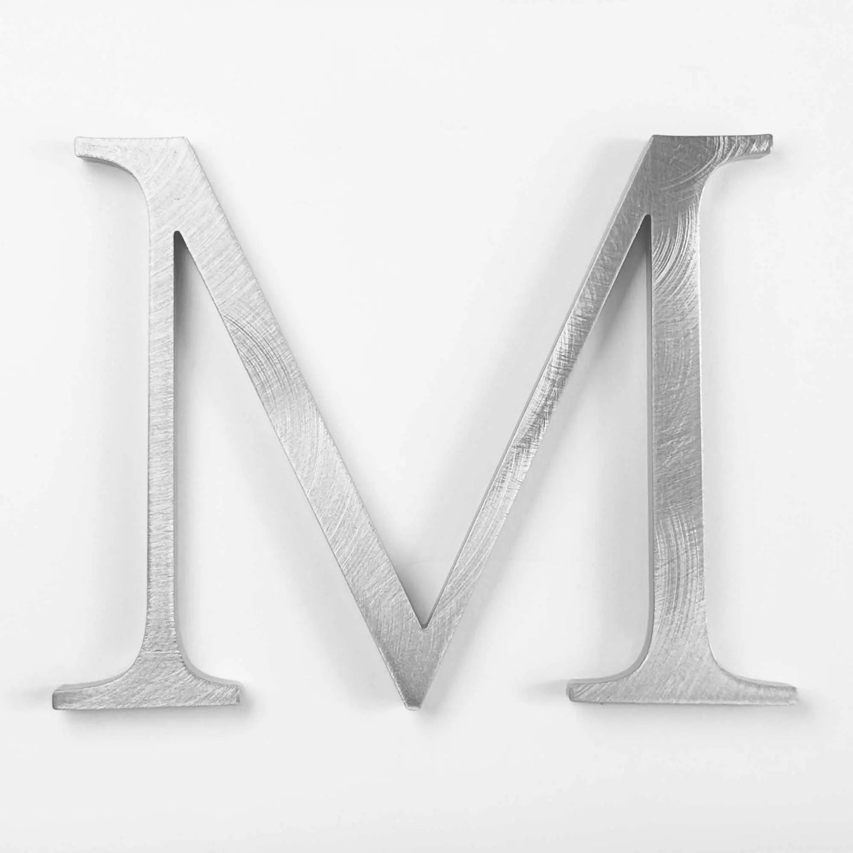 Random arc brushed solid aluminum division 10 architectural sign letter