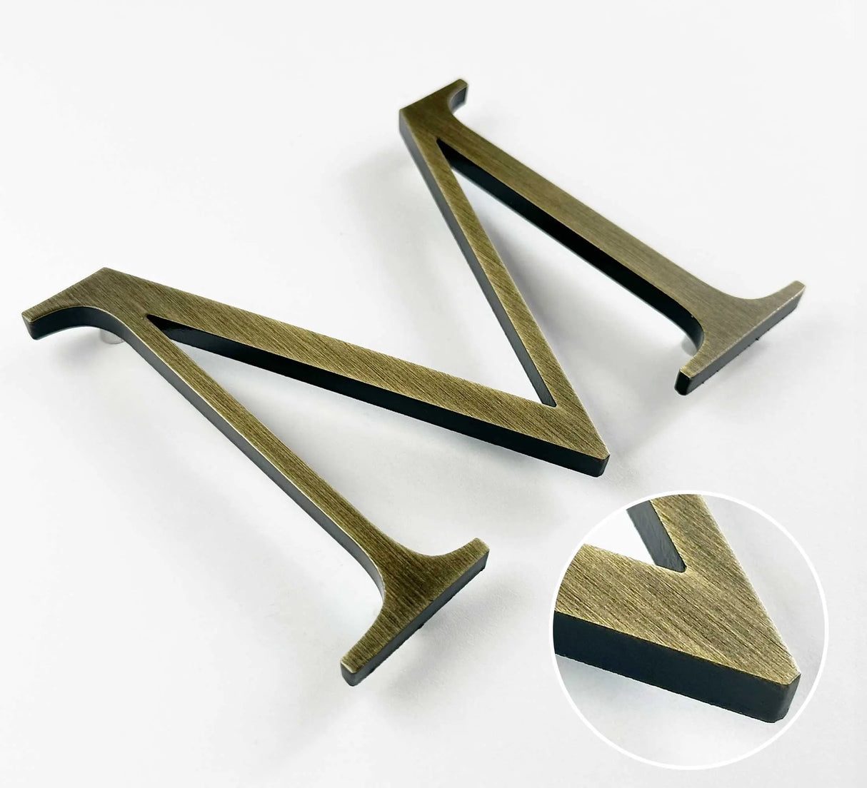 Aged solid BAA & BABA certified brass division 10 architectural sign letter with finish closeup
