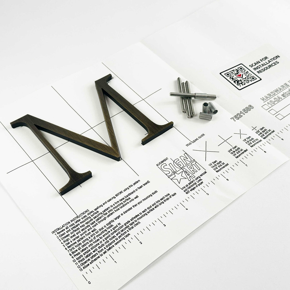 Heavily aged solid bronze division 10 architectural sign letter on mounting template with hardware