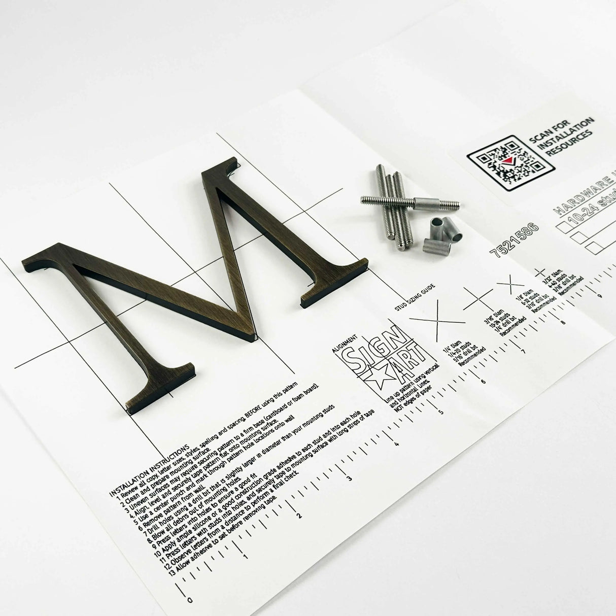 Heavily aged solid bronze division 10 architectural sign letter on mounting template with hardware