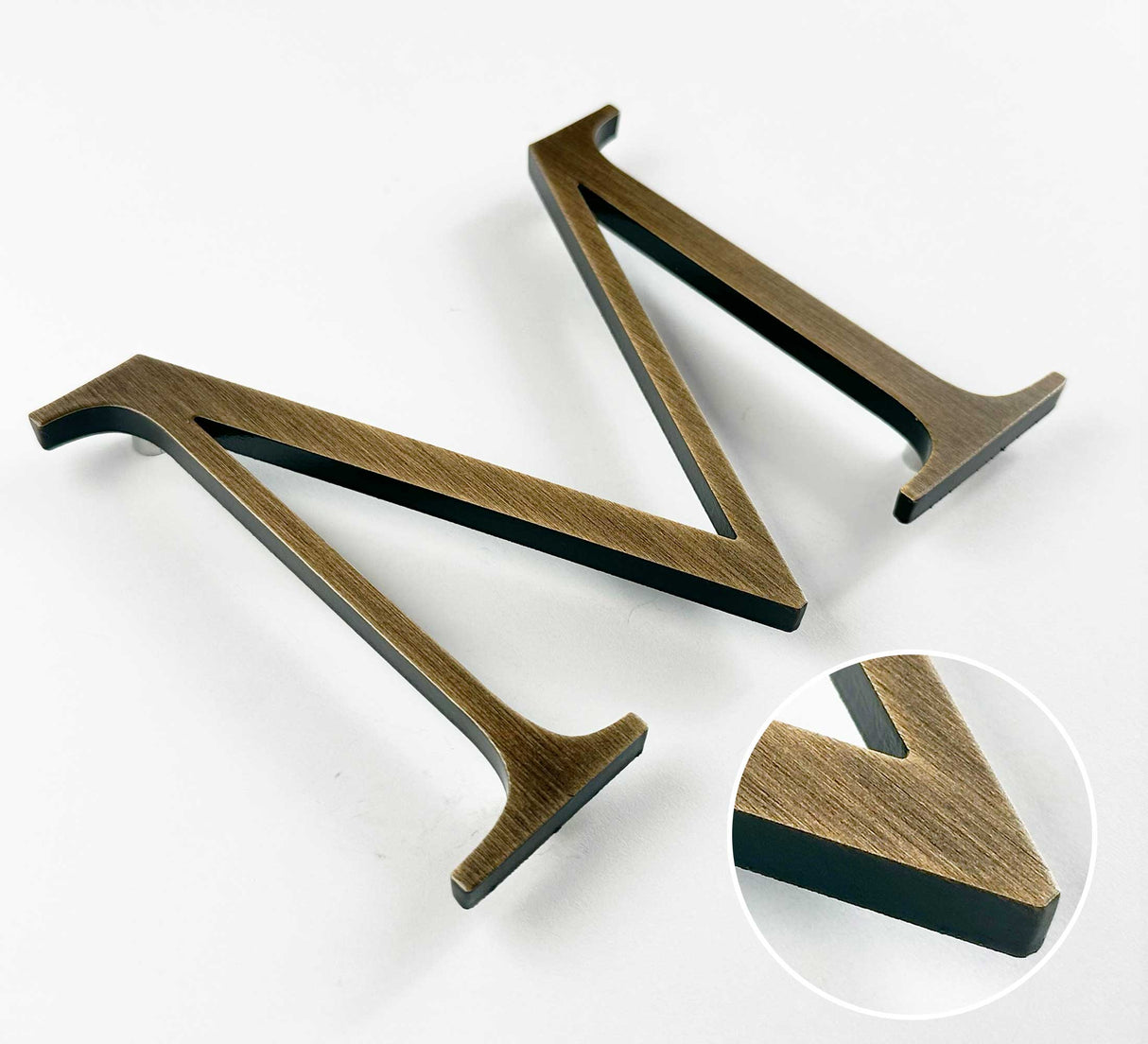 Aged solid bronze division 10 architectural sign letter with finish closeup