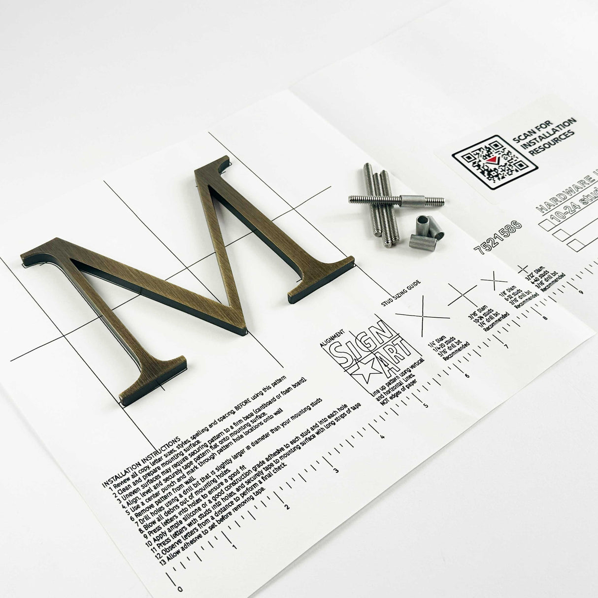 Aged solid bronze division 10 architectural sign letter on mounting template with hardware