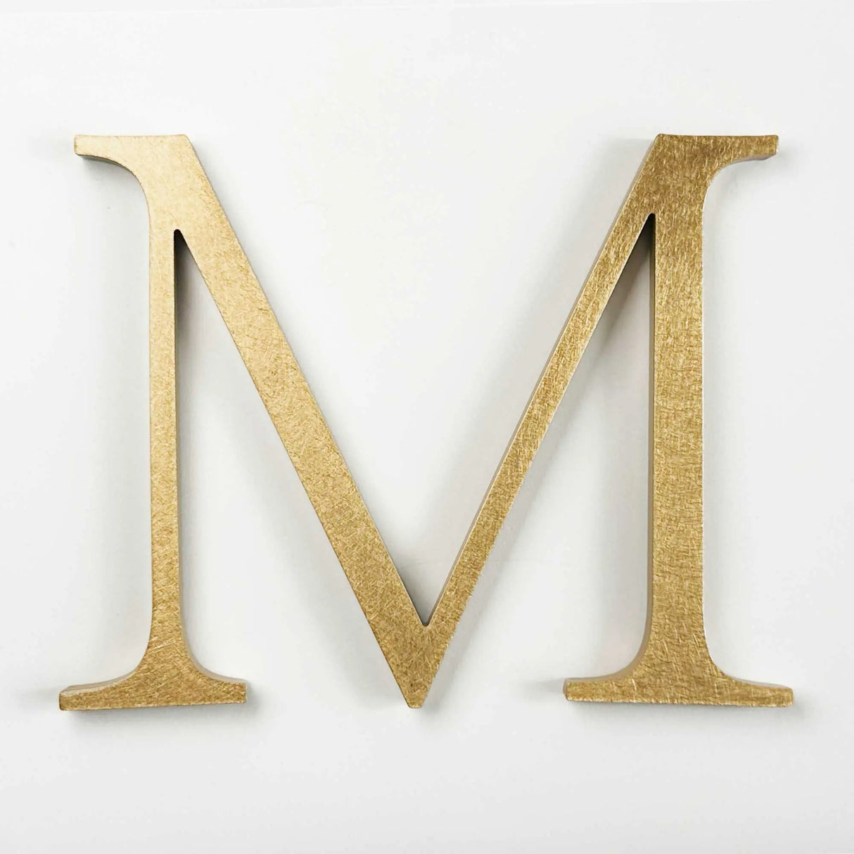 Orbitally brushed solid bronze division 10 architectural sign letter