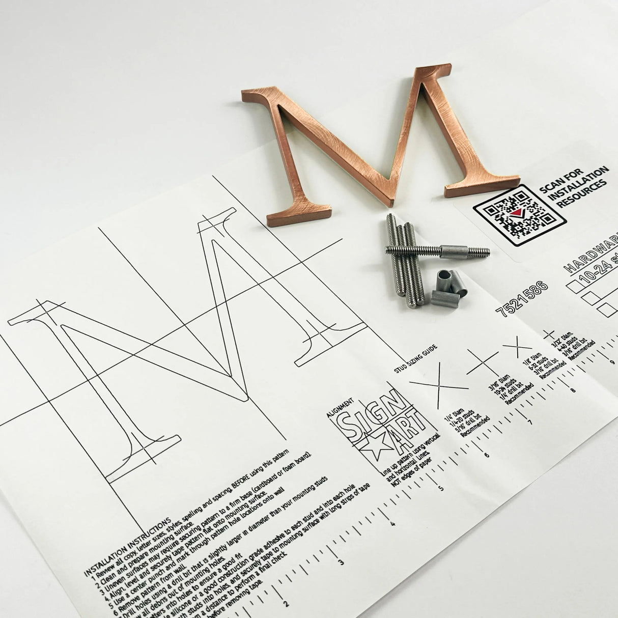 Random arc brushed solid copper division 10 architectural sign letter on mounting template with hardware