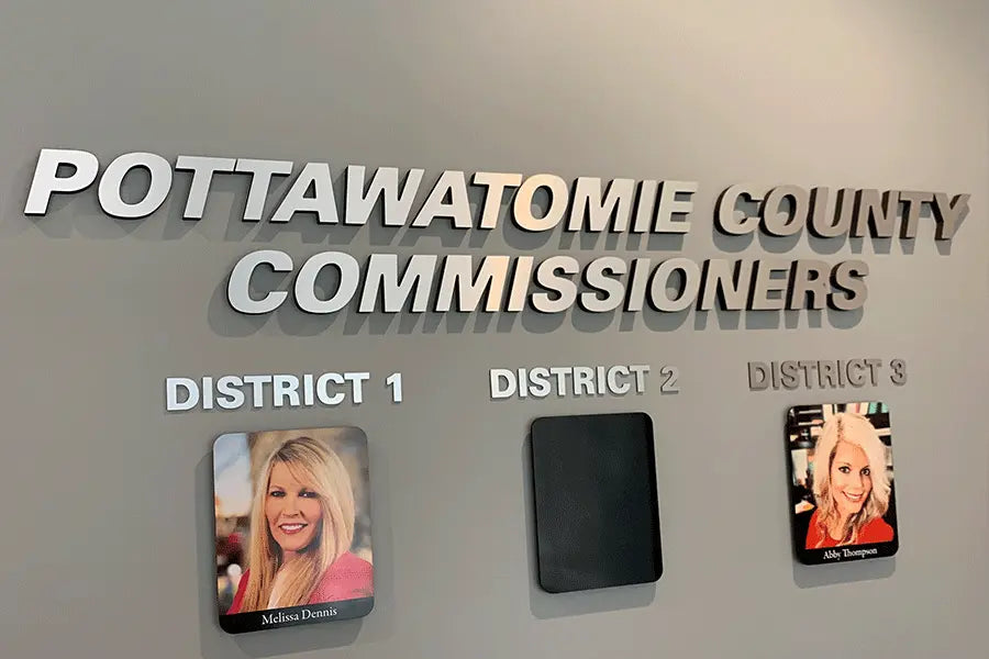 County commissioner sign with cast aluminum sign letters