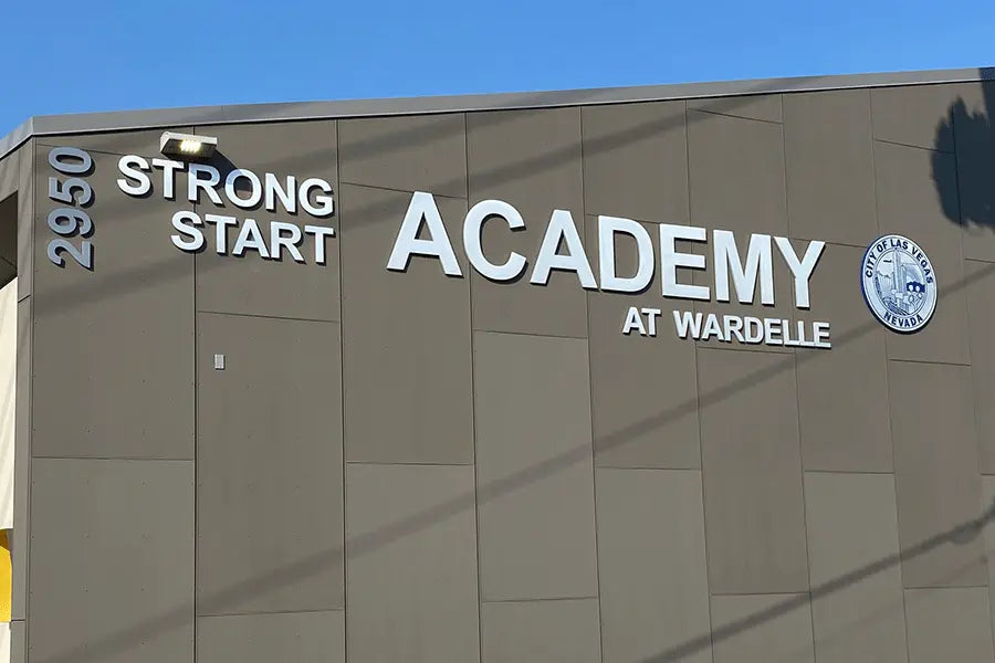 School and address number signs with cast aluminum sign letters