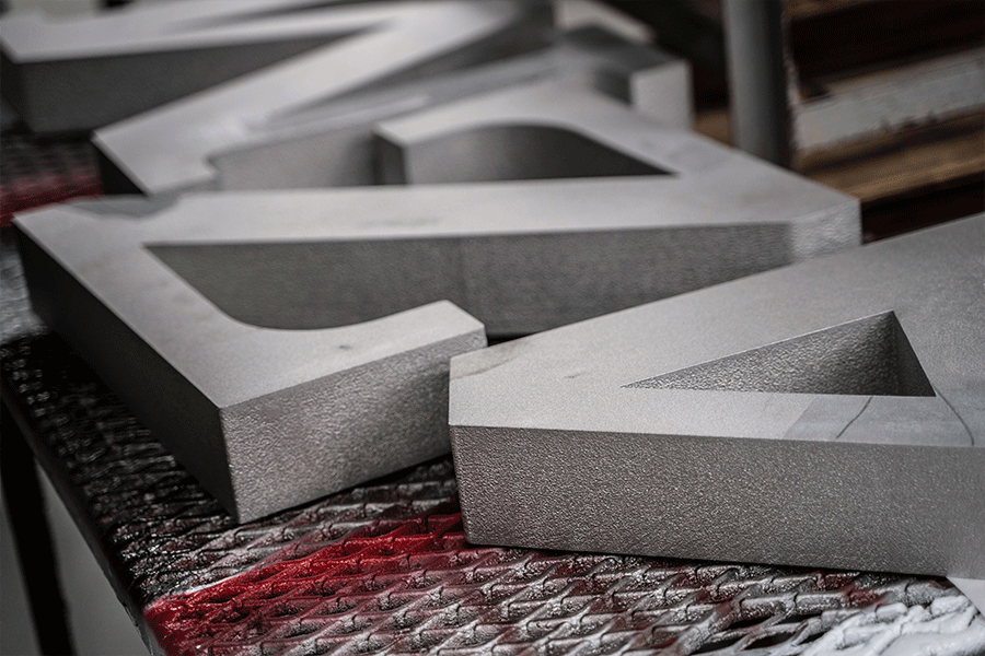 Closeup of cast aluminum sign letters