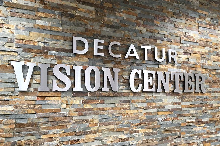 Eye doctor sign with cast aluminum sign letters