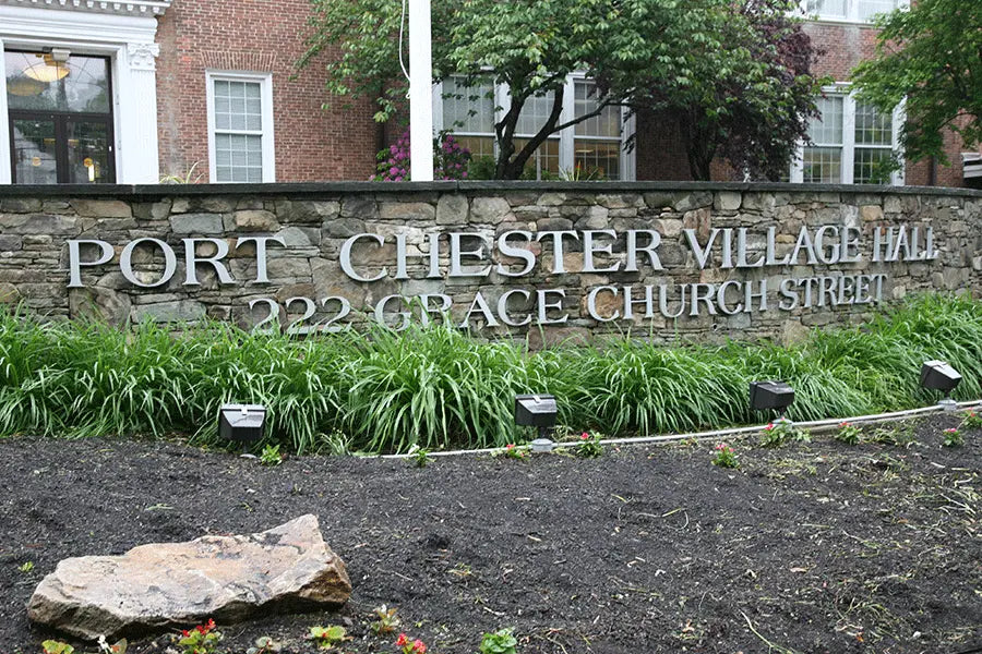 Monument sign with cast aluminum sign letters