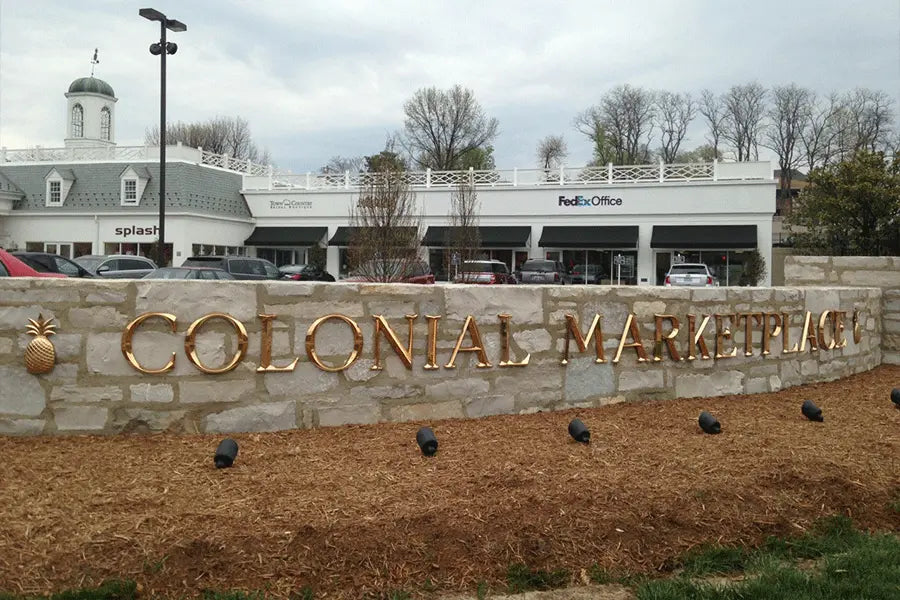 Cast bronze sign letters with a prismatic face in Architectural Font