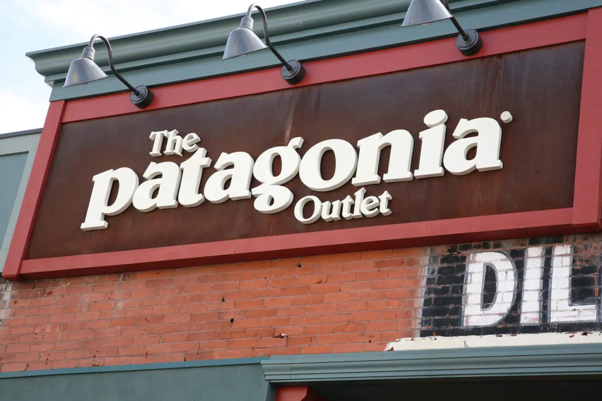 Storefront sign composed of white painted aluminum channel letters