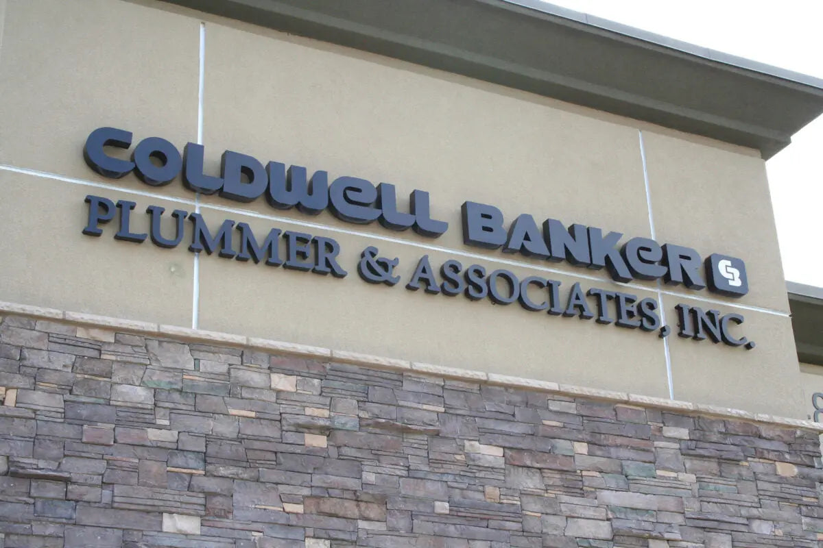 Bank sign composed of black painted aluminum channel letters