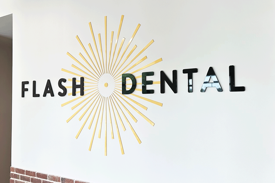 Dentist sign with painted acrylic sign letters and elements.