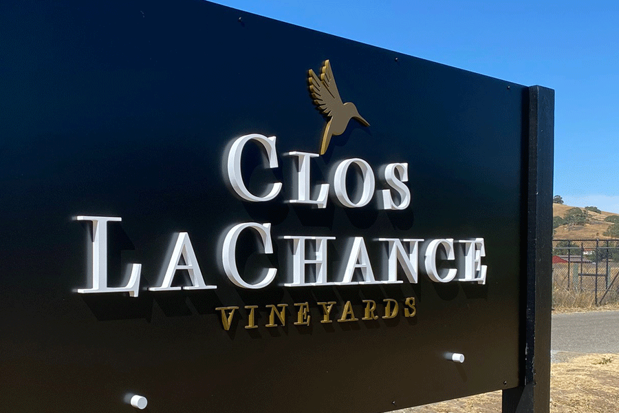Vineyard sign with painted acrylic sign letters and shapes.