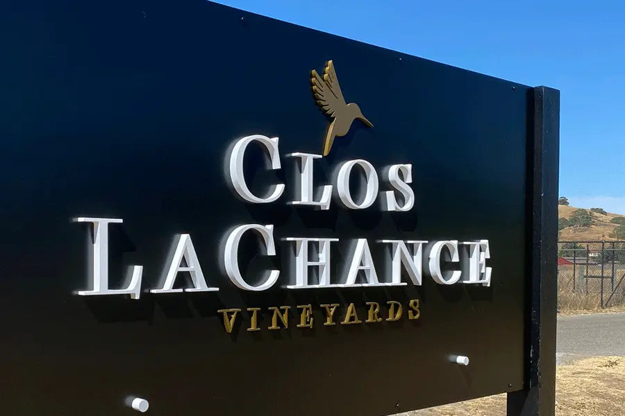Vineyard sign with painted acrylic sign letters and shapes.