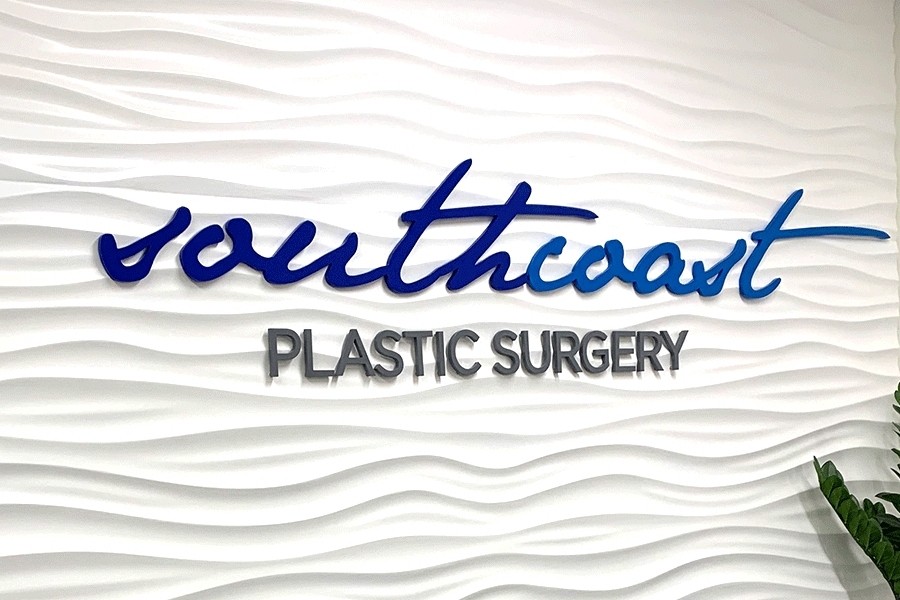 Lobby sign with painted acrylic sign letters.