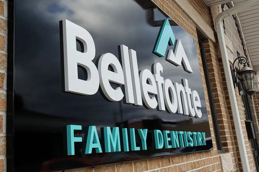 Dental office sign with painted acrylic sign letters and shapes.