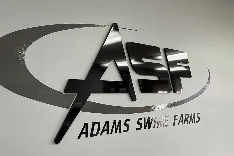 Farm sign with unpainted black acrylic sign letters.