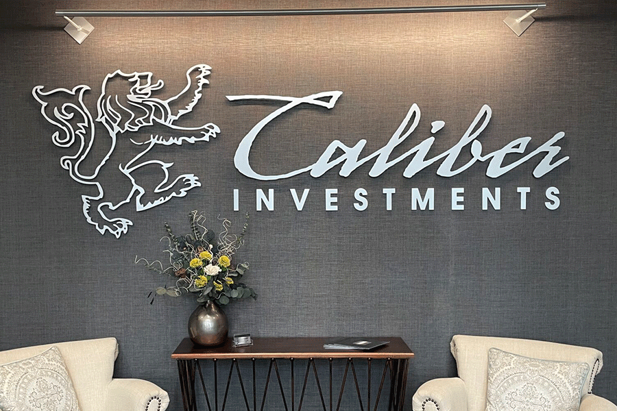 Lobby sign with stainless steel sign letters and lion.