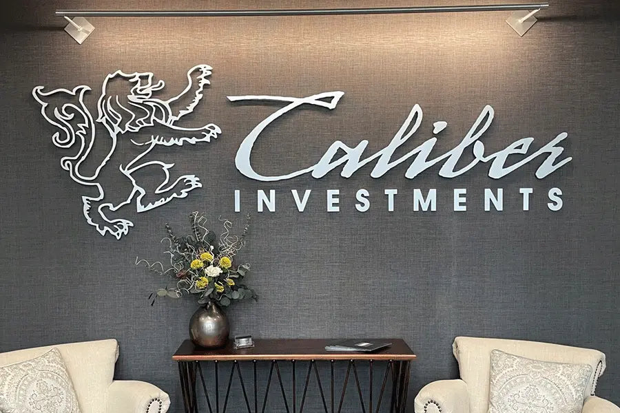 Lobby sign with stainless steel sign letters and lion.