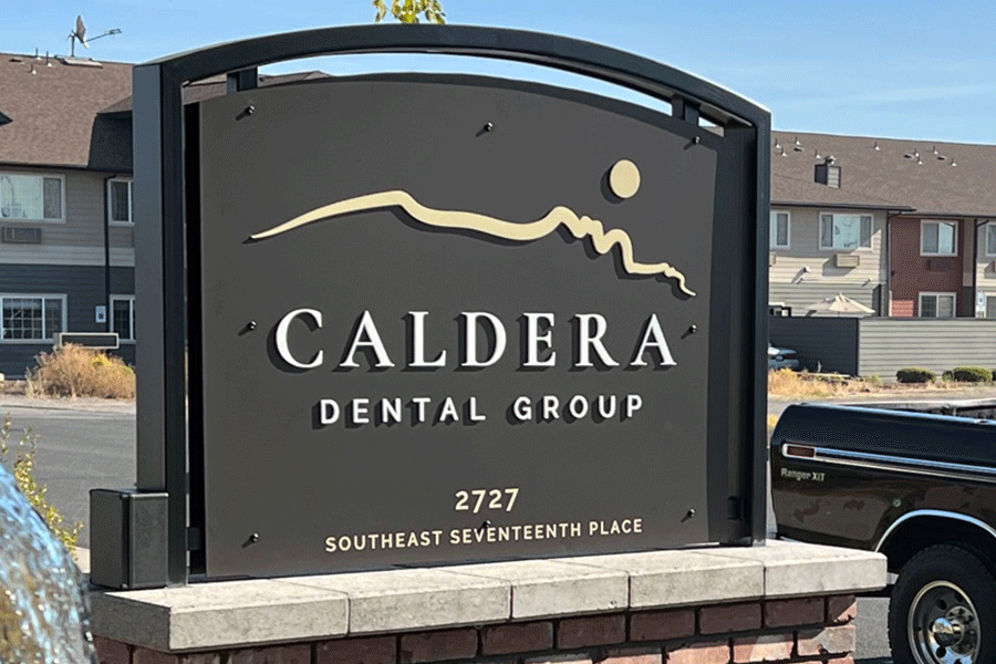 Monument sign with aluminum sign letters and address numbers.