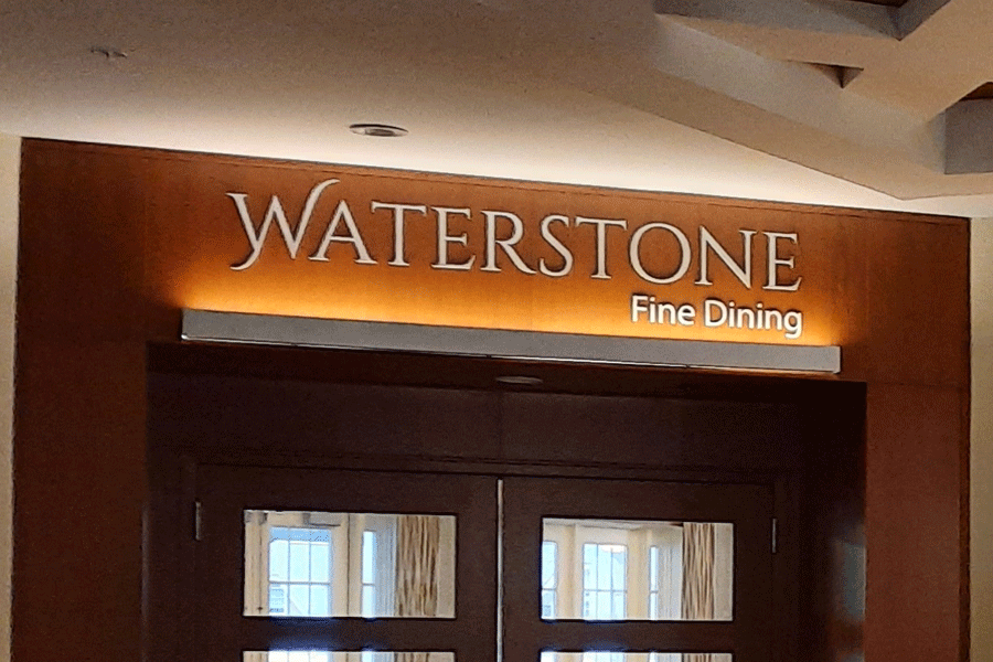 A restaurant sign with aluminum sign letters.