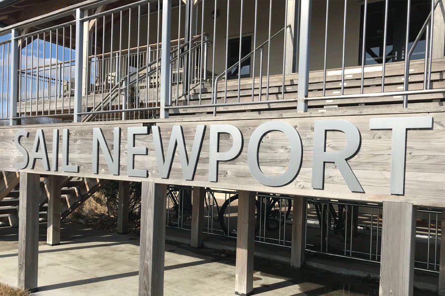 An exterior building sign with brushed aluminum sign letters.