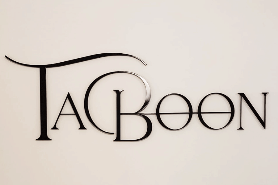 A lobby sign with black anodized aluminum sign letters.