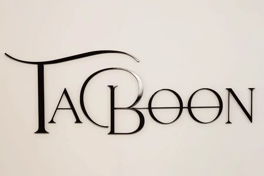A lobby sign with black anodized aluminum sign letters.