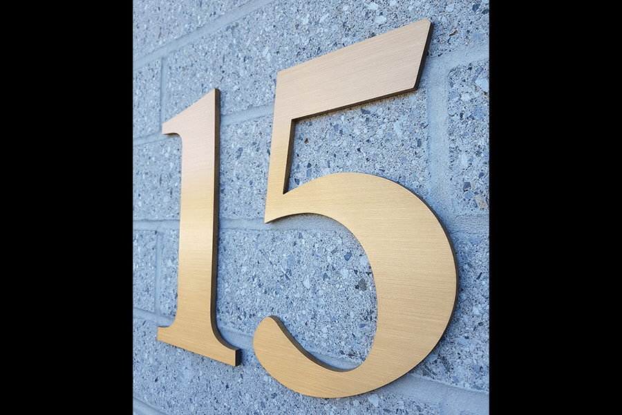 Address sign numbers in brushed brass.