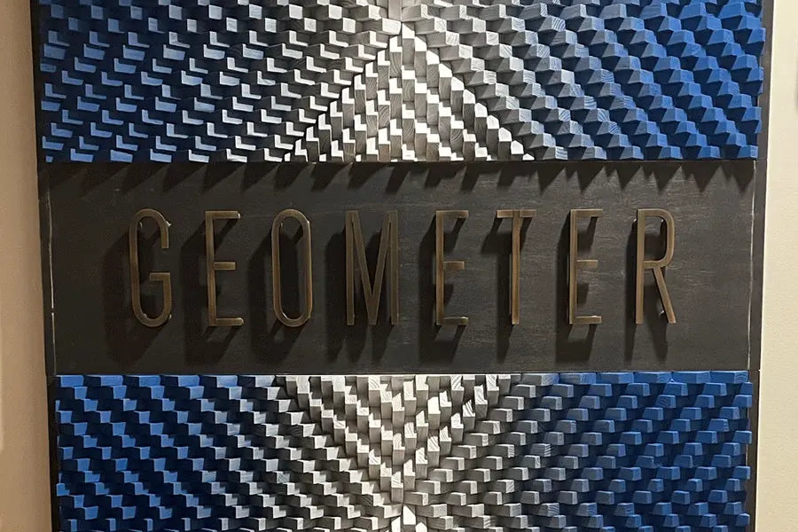 Interior wall sign with aged bronze sign letters.