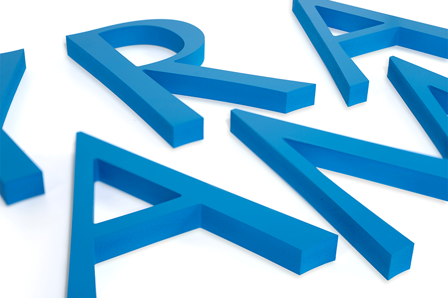 Close-up of plastic PVC sign letters.