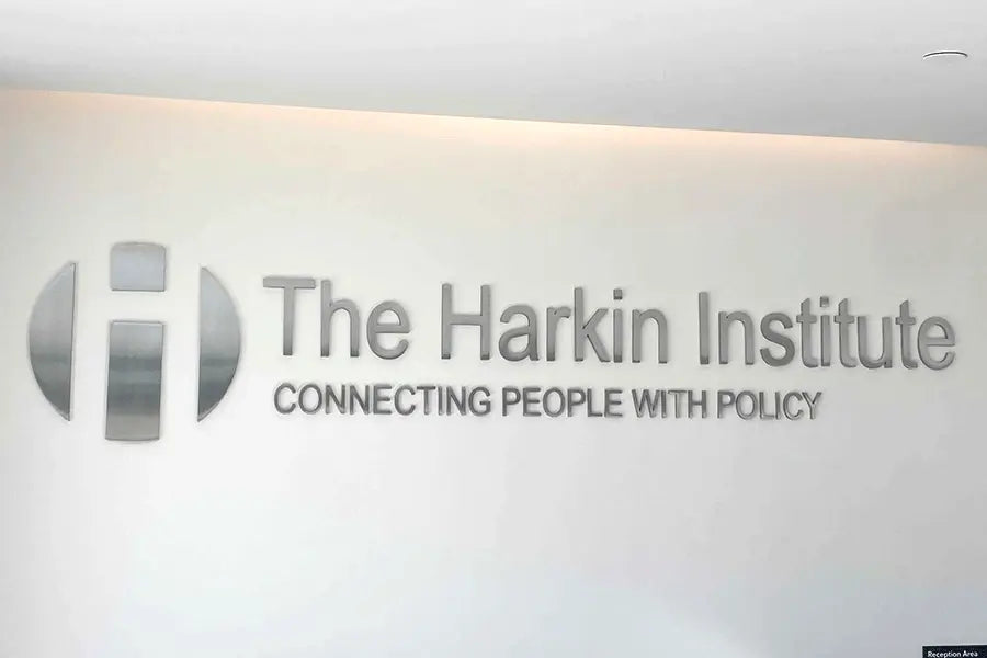 Lobby sign with polished stainless steel sign letters.