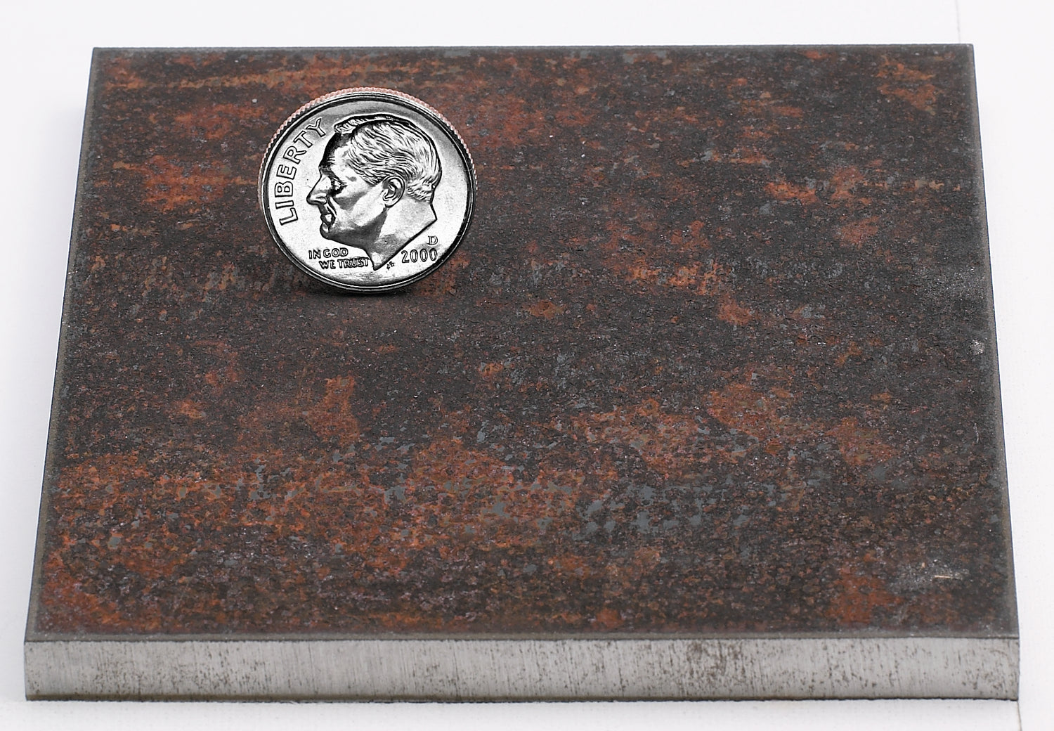 Sample of a weathered steel finish for flat cut Cor-Ten steel sign letters.