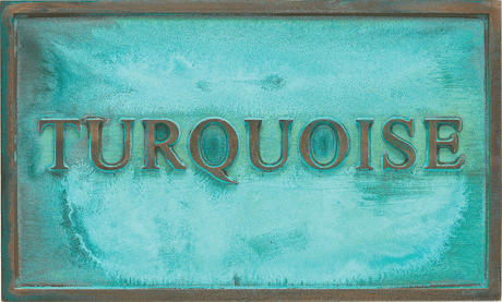 Sample of a turquoise bronze or brass patina finish for sign letters.