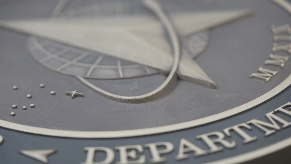 Closeup of sculpted bronze US Space Force seal