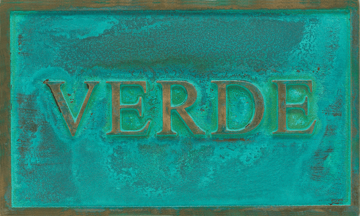 Sample of a verde bronze or brass patina finish for sign letters.