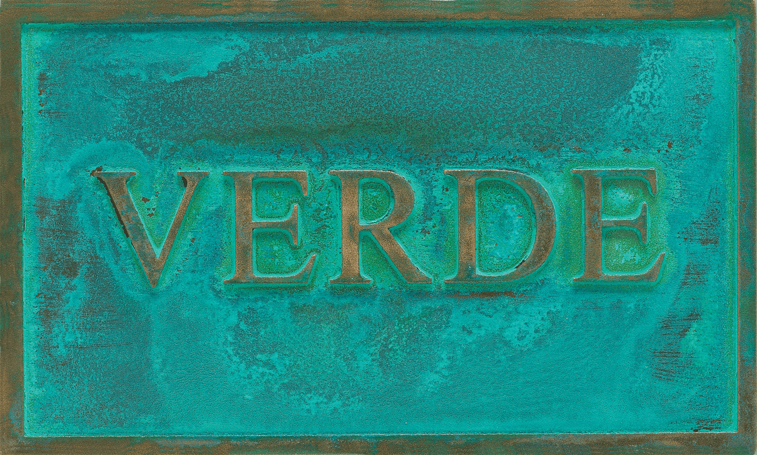 Sample of a verde bronze or brass patina finish for sign letters.
