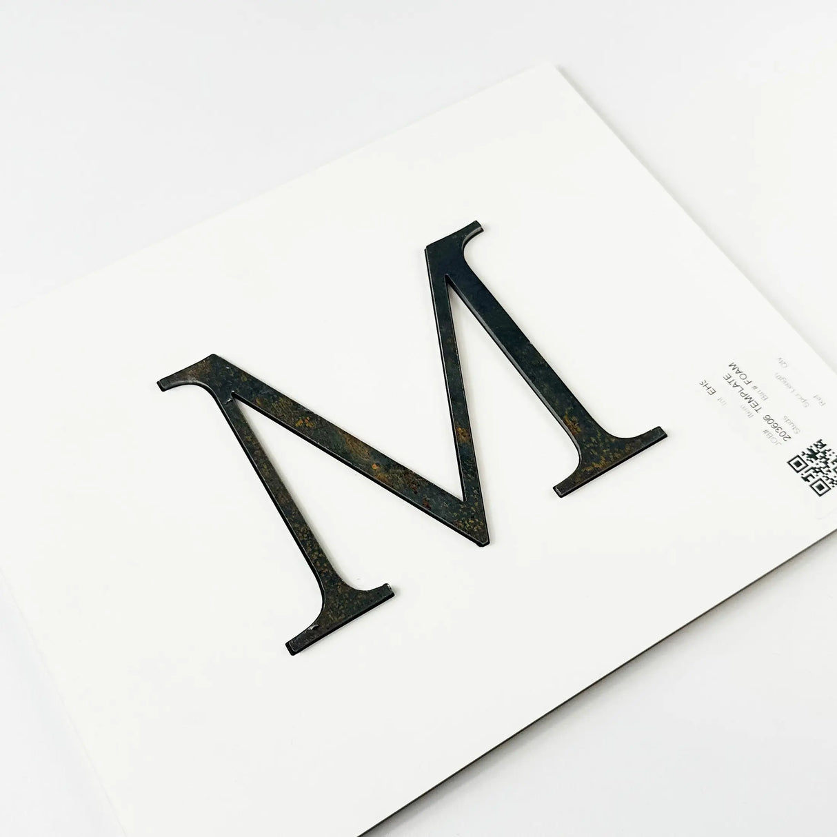 Cor-Ten steel division 10 architectural sign letter with double-sided tape on mounting template