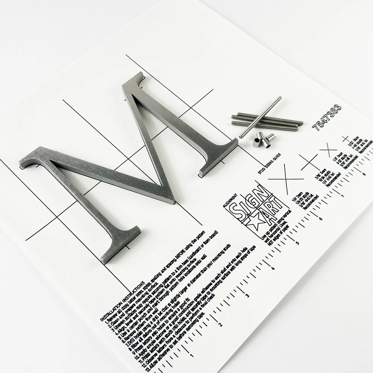 Orbital brushed stainless steel division 10 architectural sign letter with back studs on mounting template